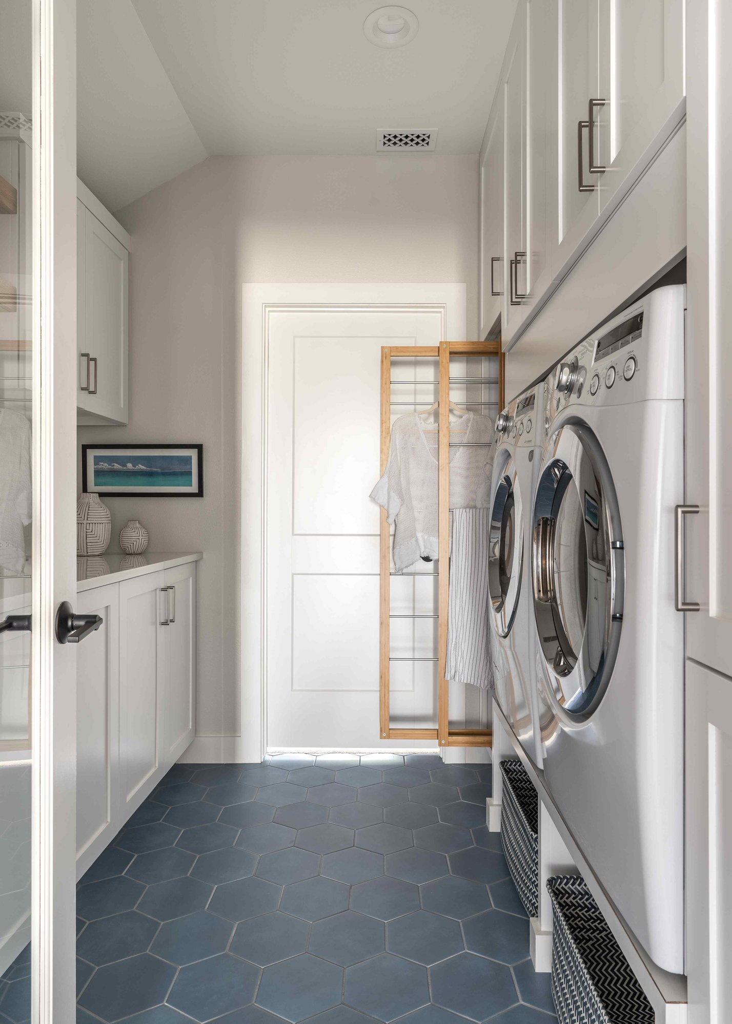 Laundry room with hex flooring | J Bryant Boyd