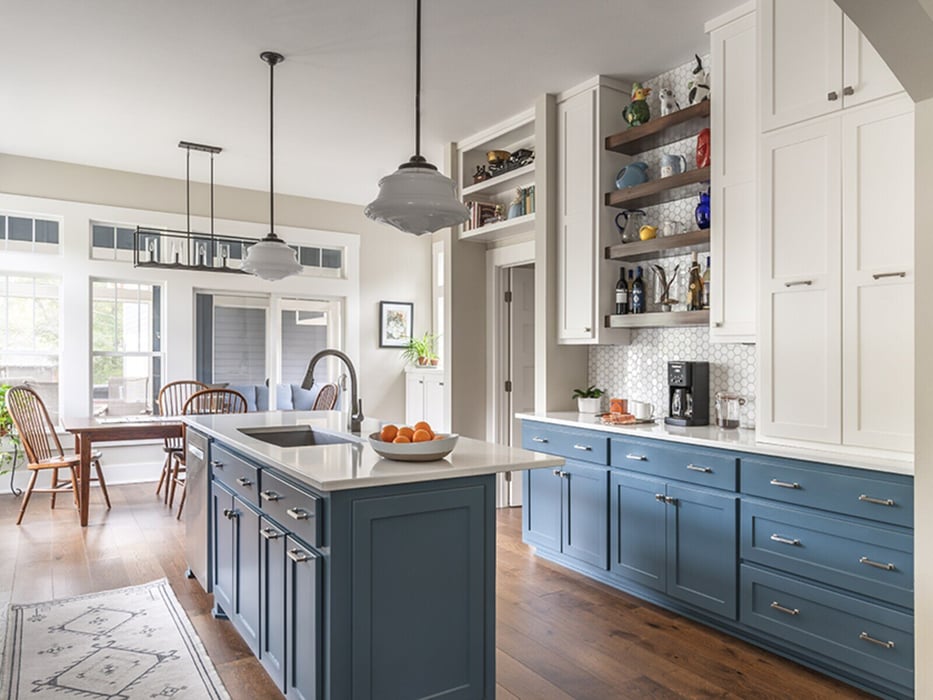 blue and white cabinets with open shelving in custom kitchen j bryant boyd georgetown tx