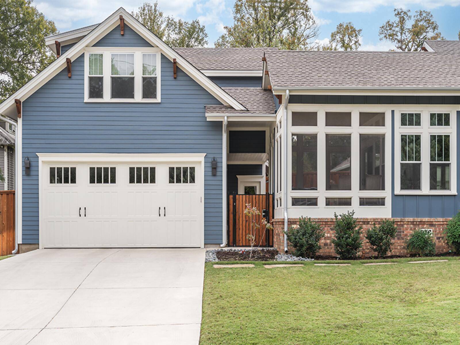 blue custom home craftsman front exterior j bryant boyd georgetown tx