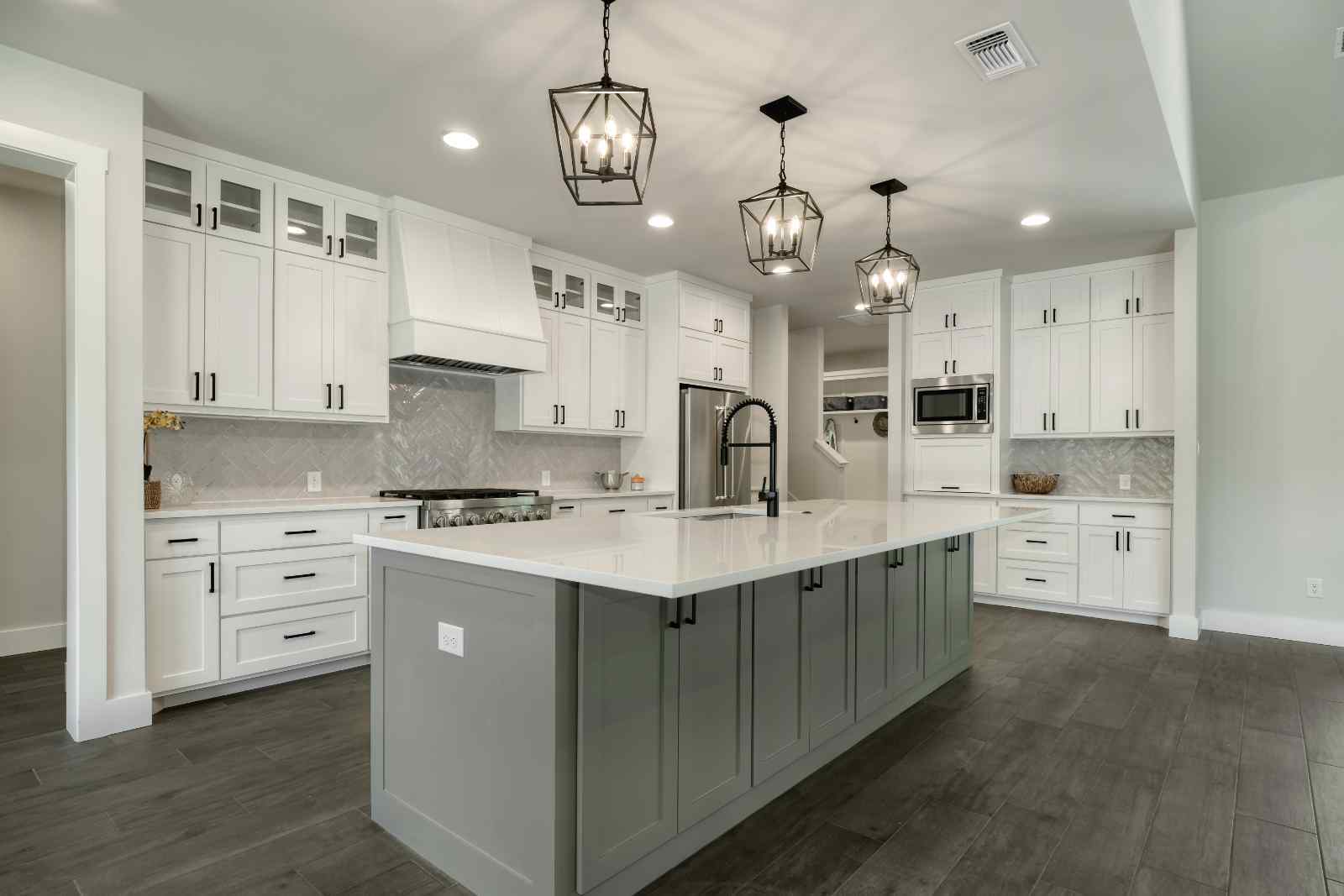 Sleek and modern custom kitchen by J. Bryant Boyd in Central Texas Hill Country