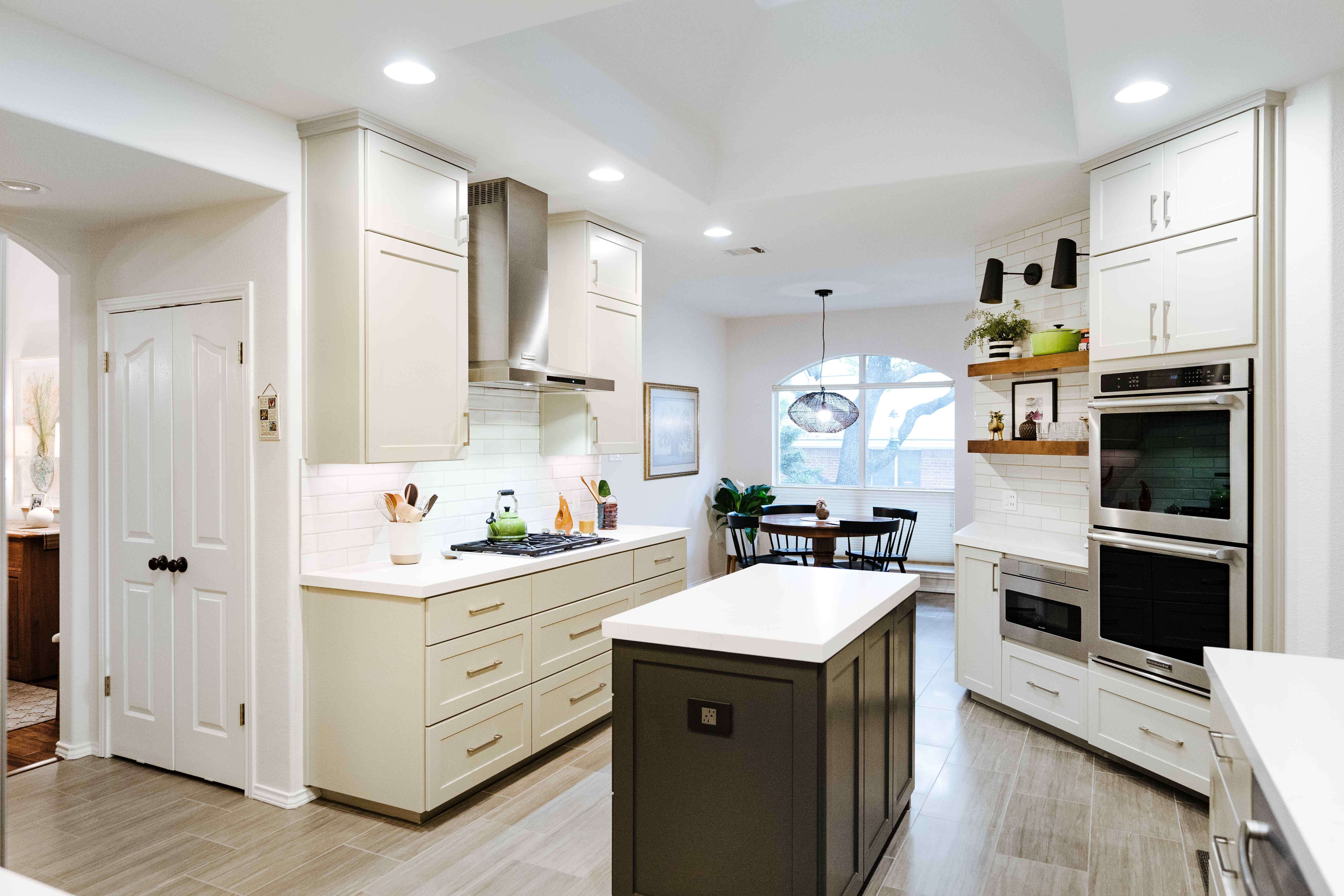 A Kitchen Reimagined with White Cabinetry and Built-In Appliances | J Bryant Boyd