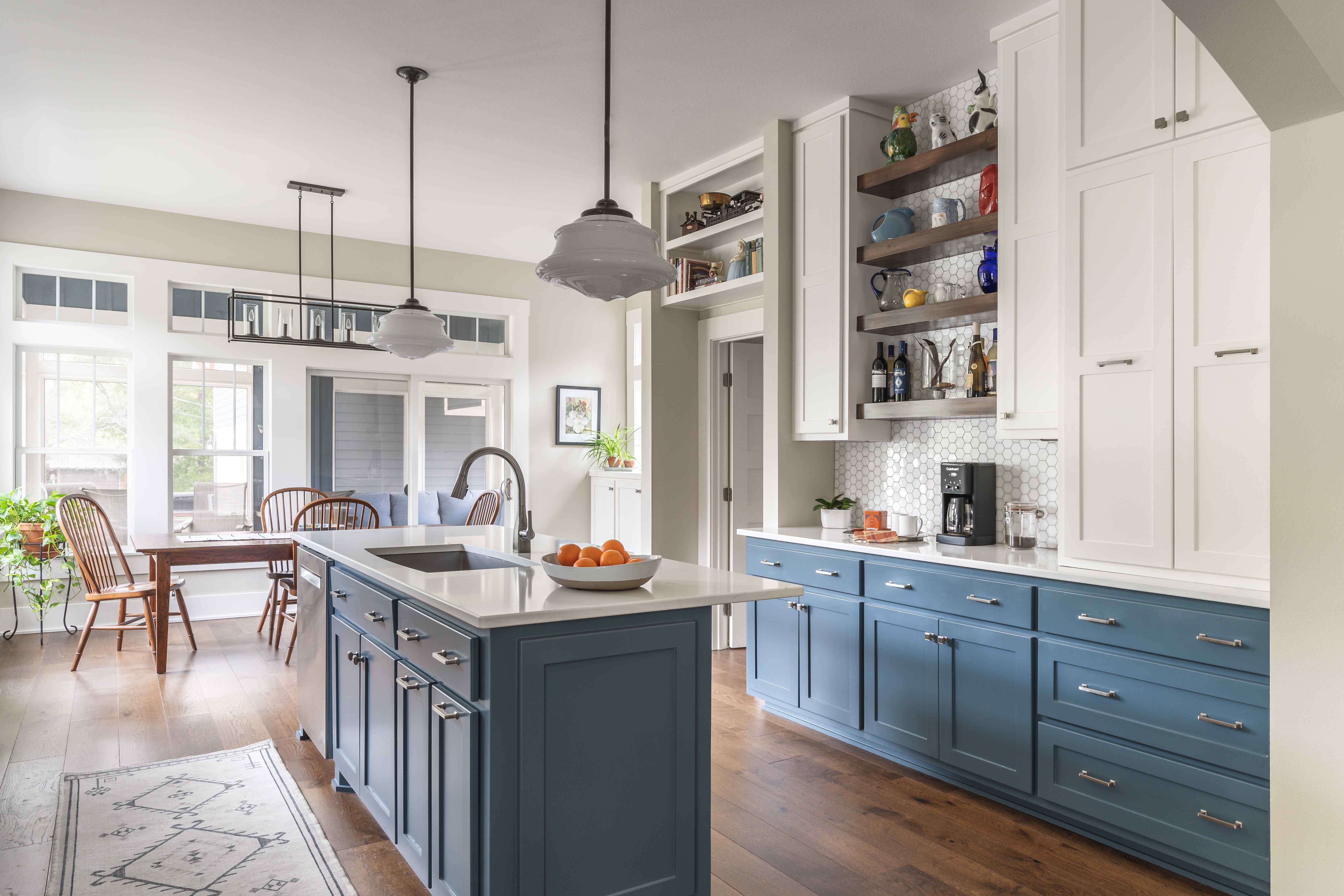 Beautiful Central TX Kitchen Boasting Natural Light and Blue Cabinetry by J. Bryant Boyd